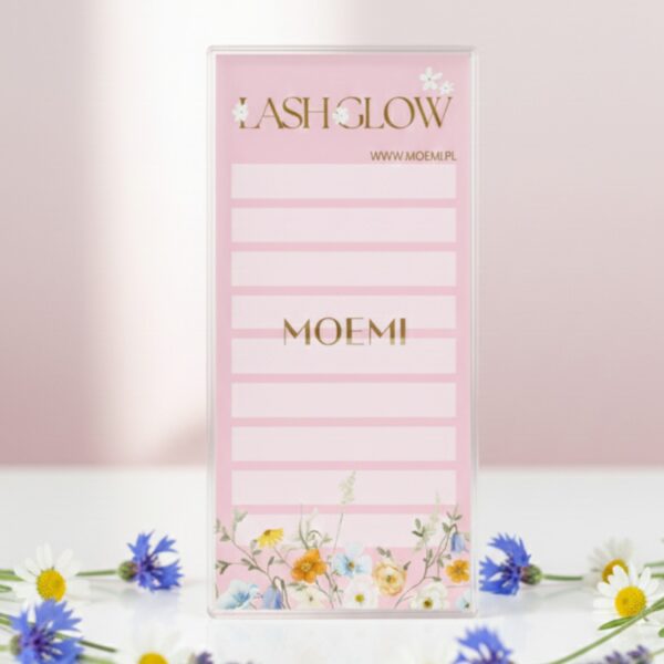 Ozdobny holder kwiatowy w kolorze różowym – stylowe wyposażenie salonu beauty.